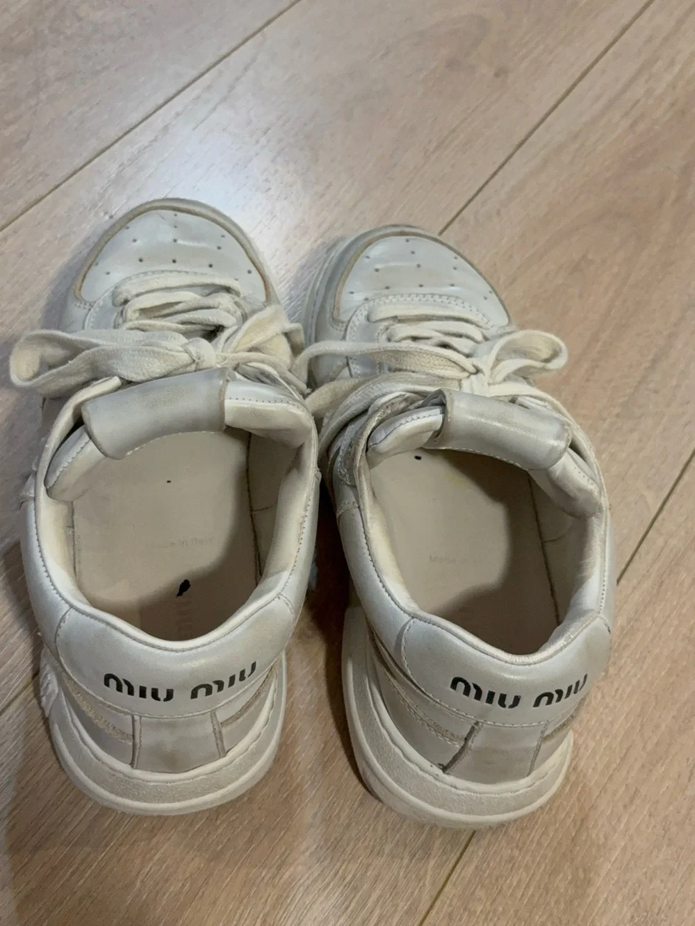 Miu Miu Off-White Leather Sneakers with Gold Trim